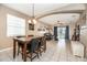 Bright dining area with view into Gathering room and backyard at 269 Fairmont Dr, Spring Hill, FL 34609