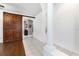 Bright entryway with a rustic barn door and tile flooring at 269 Fairmont Dr, Spring Hill, FL 34609