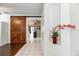 Interior entryway with a rustic barn door and tiled floor at 269 Fairmont Dr, Spring Hill, FL 34609
