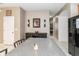 Eat in kitchen with granite countertop and black appliances at 269 Fairmont Dr, Spring Hill, FL 34609