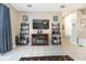 Living area showcasing a media console, built-in shelving and fireplace at 269 Fairmont Dr, Spring Hill, FL 34609