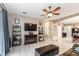 Open living room with view into kitchen and access to other rooms at 269 Fairmont Dr, Spring Hill, FL 34609