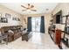 Comfortable living room with leather sofa and sliding glass doors at 269 Fairmont Dr, Spring Hill, FL 34609