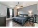 Main bedroom with king-size bed and ceiling fan at 269 Fairmont Dr, Spring Hill, FL 34609