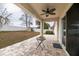 Outdoor patio with ceiling fan and backyard access at 269 Fairmont Dr, Spring Hill, FL 34609