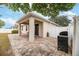 Covered patio with pavers adjacent to the house at 269 Fairmont Dr, Spring Hill, FL 34609