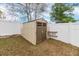 Tan and brown storage shed in backyard at 269 Fairmont Dr, Spring Hill, FL 34609