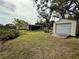 Backyard view showing a shed and screened patio at 122 Gulf Breeze Blvd, Venice, FL 34293