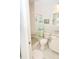 Bright bathroom features a walk-in shower with a built-in bench and tile surround at 130 Bay Plz, Treasure Island, FL 33706