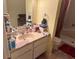 Bathroom with vanity, sink, and shower at 1415 Doolittle Ln # 107, Dunedin, FL 34698