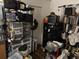 Small storage room with shelving for unit at 1415 Doolittle Ln # 107, Dunedin, FL 34698