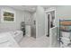 Spa-like bathroom with soaking tub, walk-in shower, and modern fixtures at 3011 39Th E St, Bradenton, FL 34208