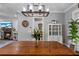 Farmhouse style dining room with a large wooden table at 3011 39Th E St, Bradenton, FL 34208