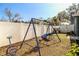 Spacious backyard with playset for children at 4101 Dellbrook Dr, Tampa, FL 33624