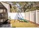 Nice backyard with playset and slide at 4101 Dellbrook Dr, Tampa, FL 33624