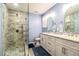 Modern bathroom with double vanity and large shower at 4101 Dellbrook Dr, Tampa, FL 33624