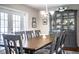 Formal dining room with a large table and gray chairs at 4101 Dellbrook Dr, Tampa, FL 33624