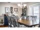 Elegant dining room featuring a large table and built-in hutch at 4101 Dellbrook Dr, Tampa, FL 33624