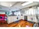 Bright white kitchen with granite countertops and stainless steel appliances at 4101 Dellbrook Dr, Tampa, FL 33624