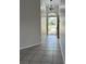 Bright entryway with tile flooring and a chandelier at 4710 Bloom Dr, Plant City, FL 33566