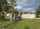 House exterior showcasing landscaping and a two-car garage at 4710 Bloom Dr, Plant City, FL 33566