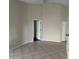 Bright living room with tile floors and sliding glass doors leading to backyard at 4710 Bloom Dr, Plant City, FL 33566