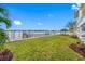 Spacious backyard with waterfront views and a private dock at 7899 Causeway N Blvd, St Petersburg, FL 33707