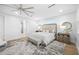 Main bedroom with hardwood floors and ensuite bathroom at 7899 Causeway N Blvd, St Petersburg, FL 33707