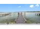 Private dock extending into the water, ideal for boating and waterfront recreation at 7899 Causeway N Blvd, St Petersburg, FL 33707