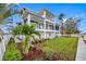 Two story waterfront home with landscaped yard and private dock at 7899 Causeway N Blvd, St Petersburg, FL 33707