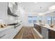 Modern kitchen with island and water views at 7899 Causeway N Blvd, St Petersburg, FL 33707