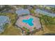 Community pool and surrounding buildings from above at 190 Pompano Se Dr # A, St Petersburg, FL 33705