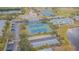 Tennis courts and community buildings from above at 190 Pompano Se Dr # A, St Petersburg, FL 33705