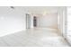 Empty dining area with tile floors and access to kitchen at 190 Pompano Se Dr # A, St Petersburg, FL 33705