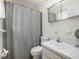 Bathroom with shower/tub, vanity, and linen closet at 250 Rosery Nw Rd # 260, Largo, FL 33770