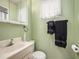 Clean bathroom with single sink vanity and shower/tub combo at 250 Rosery Nw Rd # 260, Largo, FL 33770