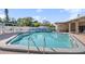 Inviting community pool with surrounding patio at 250 Rosery Nw Rd # 260, Largo, FL 33770