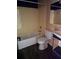 Bathroom with a tub, toilet, and vanity at 39132 County Road 54 # 2216, Zephyrhills, FL 33542