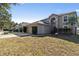 Two story home with a well manicured lawn and mature landscaping, providing curb appeal at 19245 Wood Sage Dr, Tampa, FL 33647