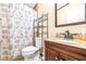 Bathroom with toilet, vanity, and shower at 1944 Sparkman Rd, Plant City, FL 33566