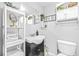 Small bathroom with vanity and shelving at 1944 Sparkman Rd, Plant City, FL 33566