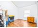 Empty bedroom with wood flooring and window at 1944 Sparkman Rd, Plant City, FL 33566