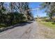 Long gravel driveway leading to a house at 1944 Sparkman Rd, Plant City, FL 33566