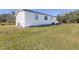 White single wide mobile home with yard at 1944 Sparkman Rd, Plant City, FL 33566