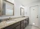 Double vanity bathroom with granite countertop at 4512 Preston Woods Dr, Valrico, FL 33596