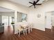 Bright dining area with wood flooring and built-in seating at 4512 Preston Woods Dr, Valrico, FL 33596