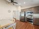 Kitchen with stainless steel appliances and dark brown cabinets at 4512 Preston Woods Dr, Valrico, FL 33596