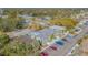 Aerial view of condo complex showcasing building arrangement and parking lot at 1799 N Highland Ave # 26, Clearwater, FL 33755