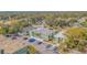 Complex overview; showcasing building layout, landscaping, and ample parking at 1799 N Highland Ave # 26, Clearwater, FL 33755