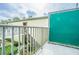 Private balcony with green privacy screen at 1799 N Highland Ave # 26, Clearwater, FL 33755